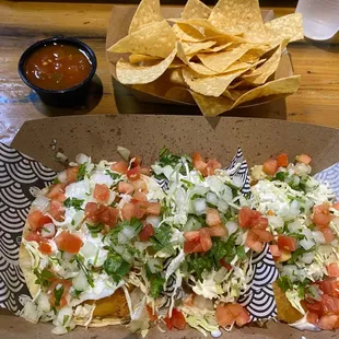 3 fish tacos and chips with salsa