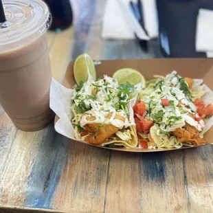 Ensenada Fish Tacos , Ensenada Shrimp Taco, and a Large Hortchata.