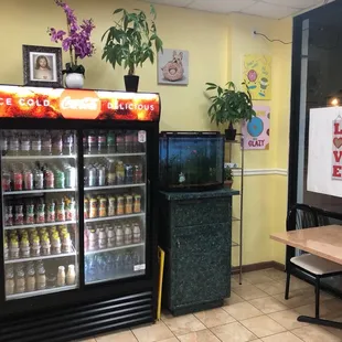 Beverages and a cute little aquarium.