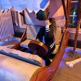 Flintstones car at one of the holes