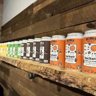 a row of cans on a shelf