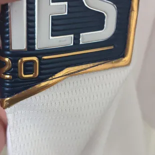 See the patches stitching? Notice all the loose threads and some that jump halfway across the patch before being randomly stitched back in.