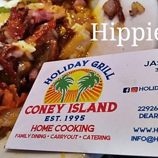 a slice of pizza and a business card