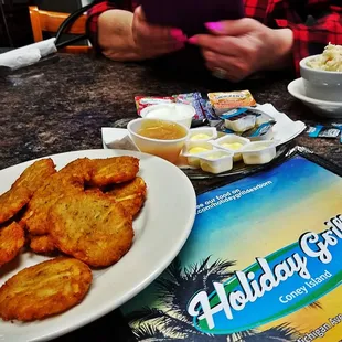 a plate of fried food on a table