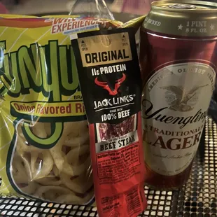 a can of jack's root beer, a bag of chips, and a can of jack's root