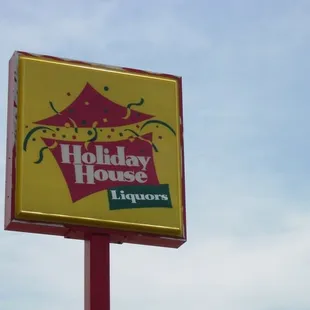 a sign for holiday house liquor