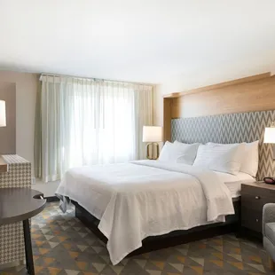 Corporate travelers love our single king guestrooms, which provide a large, plush bed plus room enough to tackle any business related tasks.
