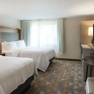 Double Queen guestrooms - perfect for families or teams visiting Bloomington, Minnesota!