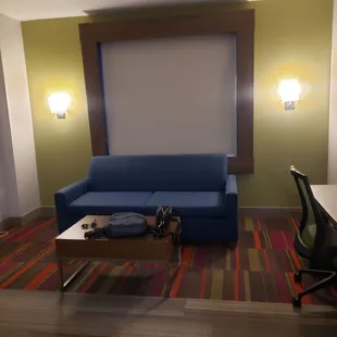 Pull out sofa for the guests you may drag back to room after a bender