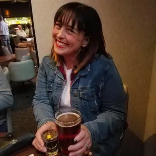 A girl and her standard.  A beer and a shot of Jameson