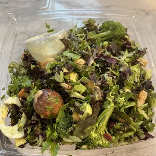 Just ordered a salad from the HMS salad bar &amp; this little gem was in there (see gigantic avocado pit). How does that ever happen?!