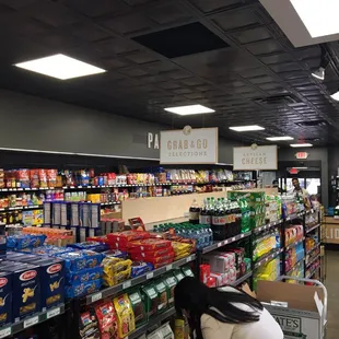 a woman shopping in a grocery store