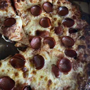 Burnt crust, cheese all falling off