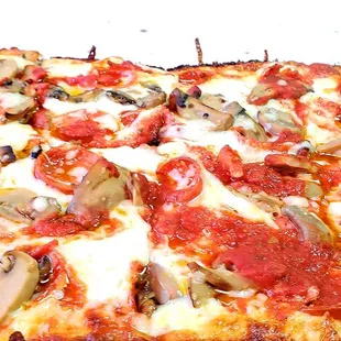 Mushroom and Pepperoni medium deep dish pie.