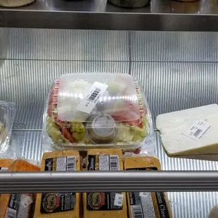 a display of cheese and other foods