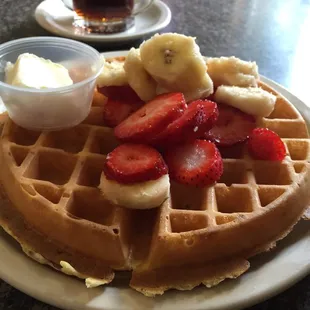 Belgian waffle with strawberries + bananas