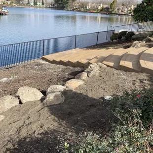 Boulders installed while keeping a "natural" look. Very pleased.