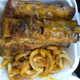 Rib platter! Comes with a soda. I had a mix of the sweet and hot sauces.