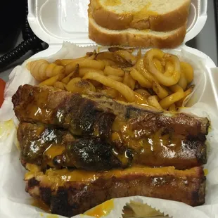 Rib platter with curly fries and sweet sauce. $7.50