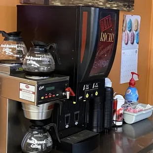 a coffee maker and coffee pot