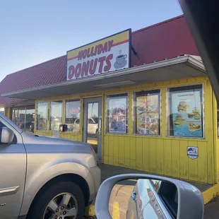 a reflection of a car in a mirror