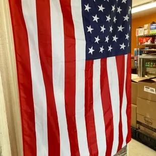 an american flag hanging in a store