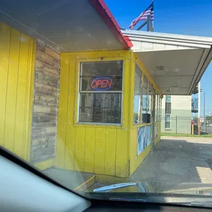 a view of the outside of a restaurant