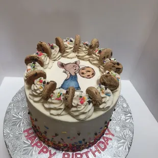 a birthday cake with teddy bears