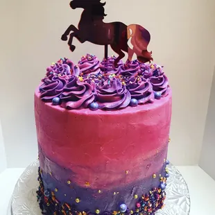 Unicorn cake. Filled with rainbow layers!