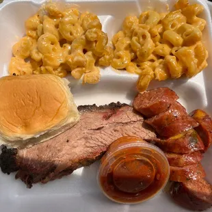 2 meats with 2 sides. Brisket and jalepeno cheddar sausage with double Mac