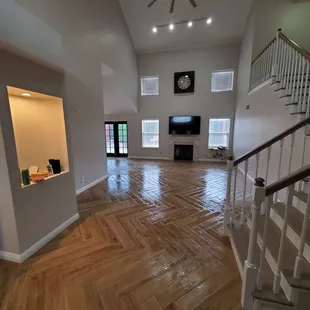 a living room with hardwood floors