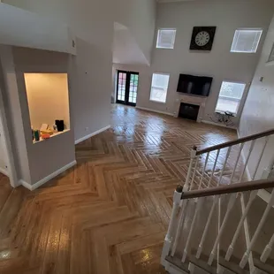 a view of a living room from the stairs