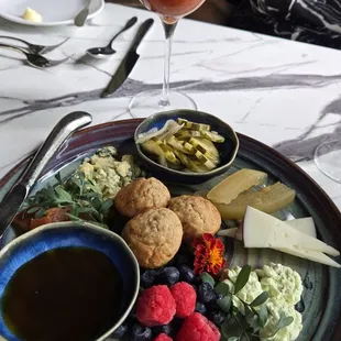 Beautiful cheese tray with blood orange jammie syrup