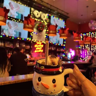 a mug of hot chocolate with marshmallows in it