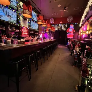 a bar with christmas lights
