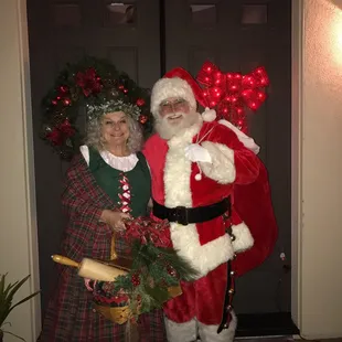 Santa &amp; Mrs Claus waiting to get the ok to ring the bell! They are just incredible!