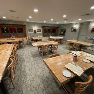 a dining room with tables and chairs