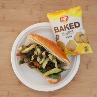  sandwich and chips on a plate