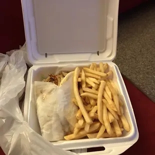 Grilled chicken pita (tomatoes, lettuce, mayo, Swiss cheese and onions) with fries.