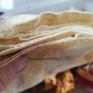 Thin pita bread, not the good fluffy type. Underwhealming.