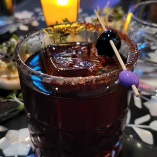 a drink with a toothpick in it