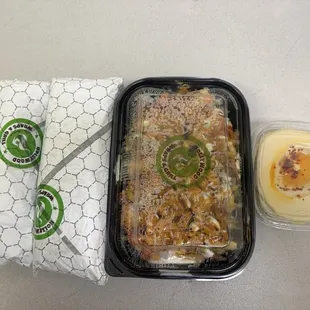 Just delivered - chicken pesto, kebab wrap, loaded fries, and hummus.