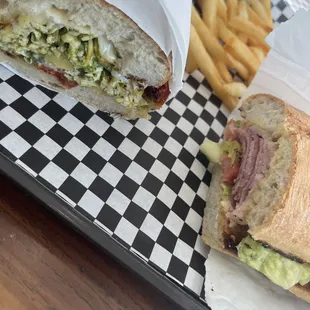 Pesto chicken on the left and the Italian sandwich on the right. Best pesto sandwich I&apos;ve ever had. Loved both sandwiches.