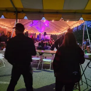 a group of people under a tent