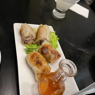 Spring Rolls (4) and ginger drop