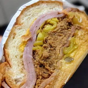 Cubano-Italiano panini, salty, spicy and just satisfying. You&apos;ll want to finish your meal with a mini cannoli
