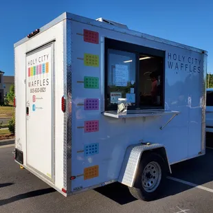 a food truck in a parking lot
