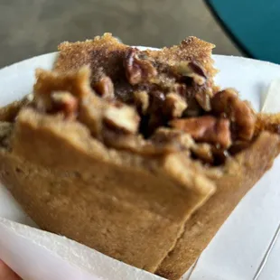 a person holding a pastry