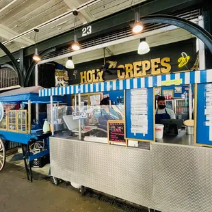 a cart with a cart of crepes
