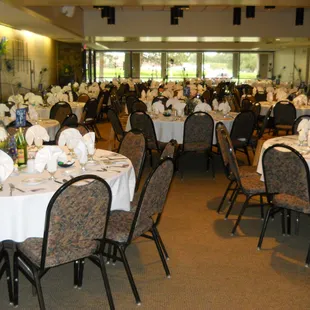 tables and chairs set for a banquet